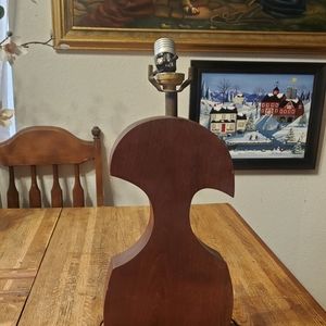 Heavy solid hand carved vintage wooden lamp.